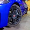 Black AlloyGator Wheel and Tyre Protection on Blue Jaguar